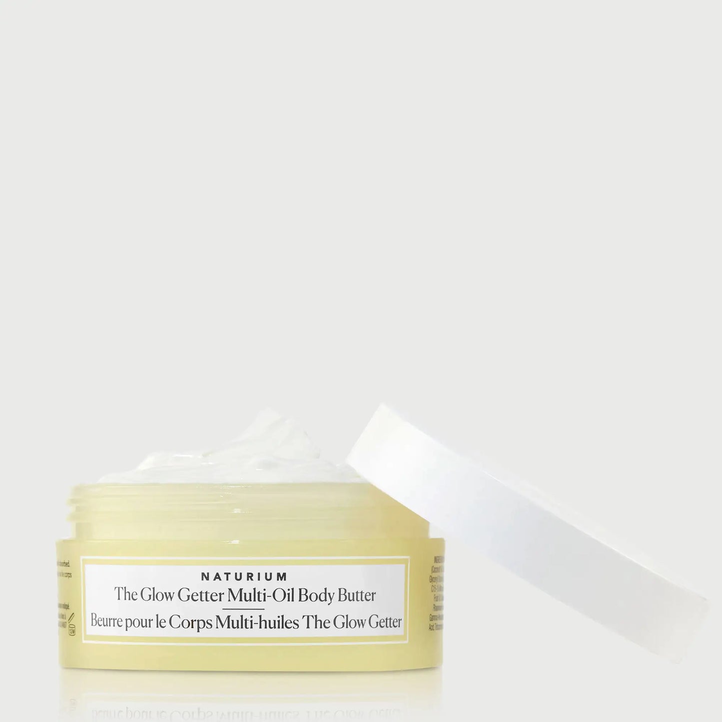 the-glow-getter-multi-oil-body-butter-travel-size-b2 NATR-40115_Glow-Getter-Body-Butter-Mini_front_capoff_bonebkgd.webp