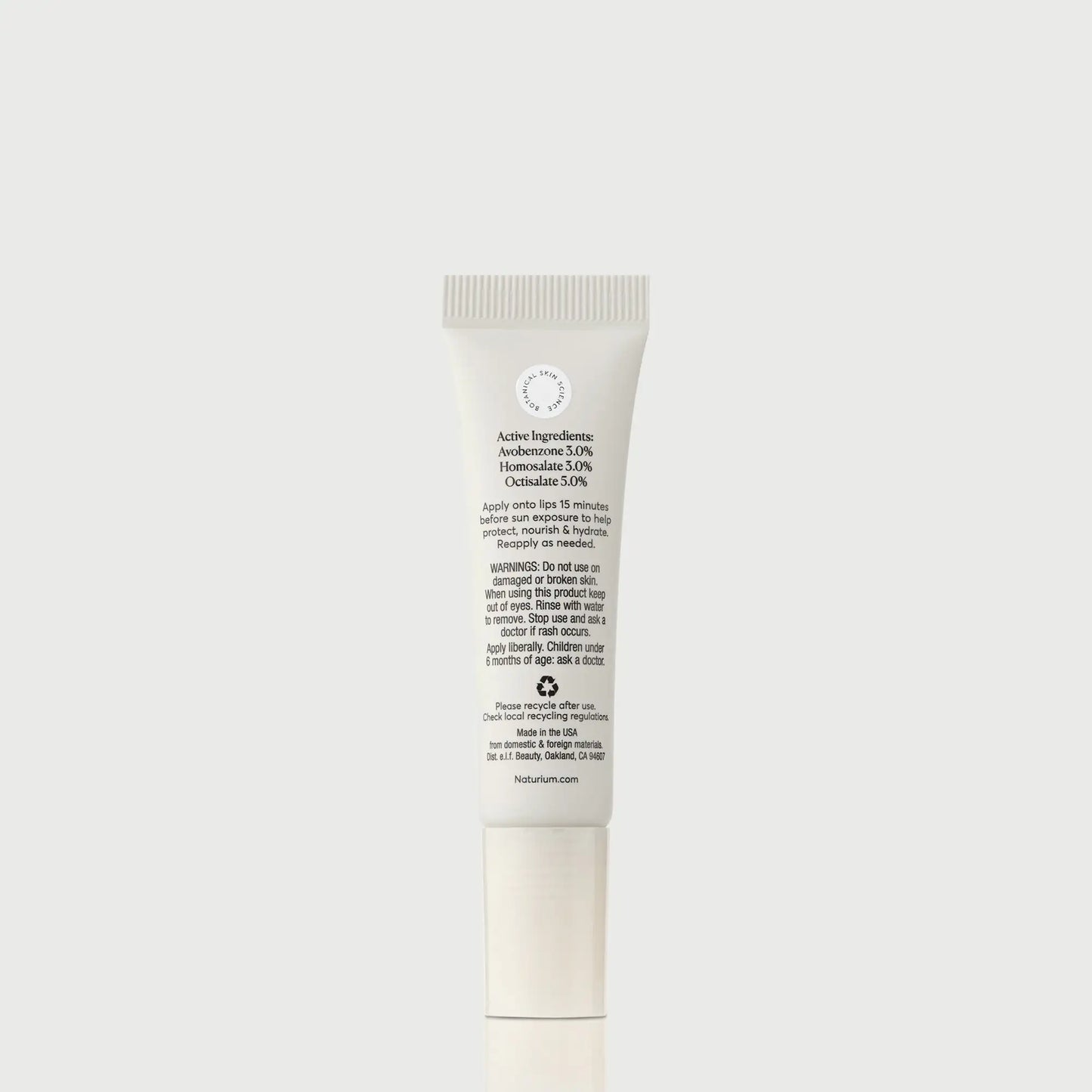 phyto-glow-lip-balm-spf-45-clear-c3 NATR-10124_PhytoGlow_SPF_Clear_primary_capon_back_bonebkgd_1.webp