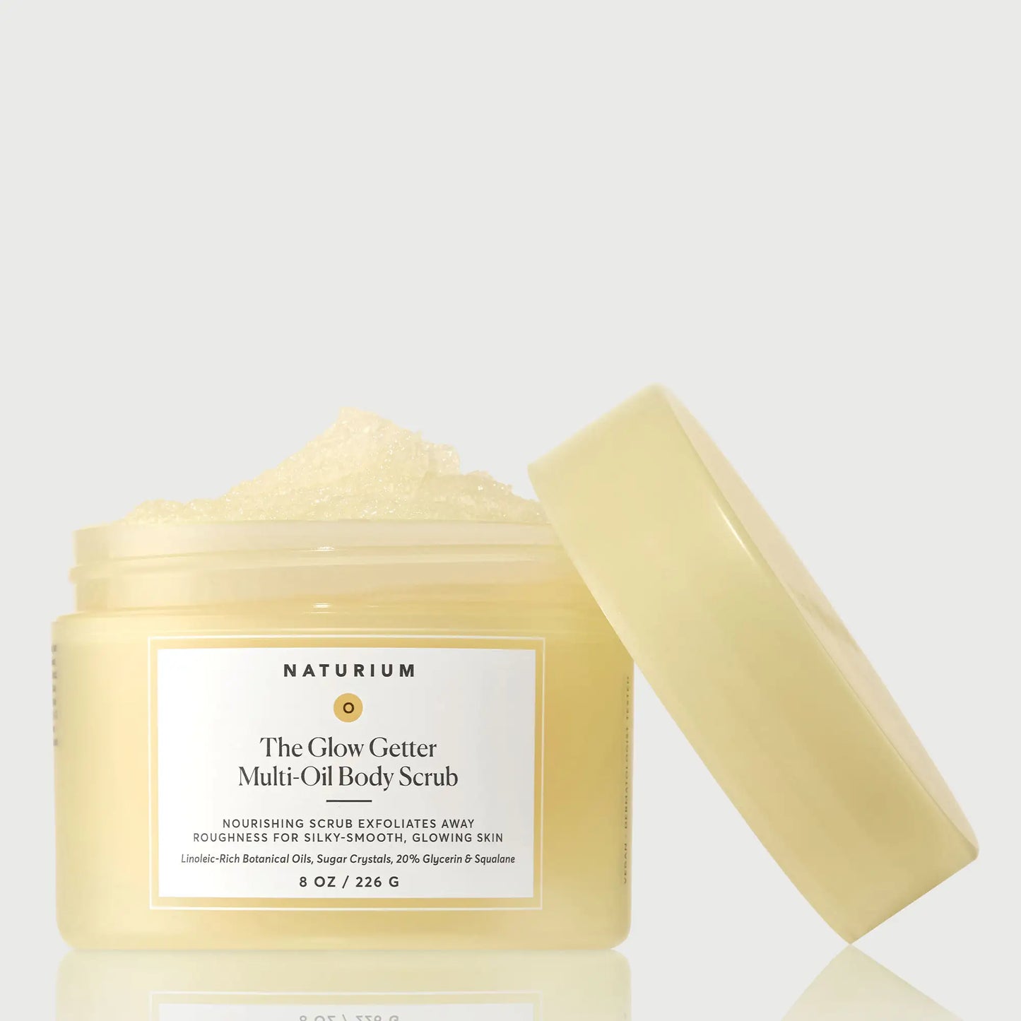 the-glow-getter-multi-oil-body-scrub-s6 NATR-40028-GlowGetter-Multi-Oil-Body-Scrub-Front-CapOff-bonebkgd.webp