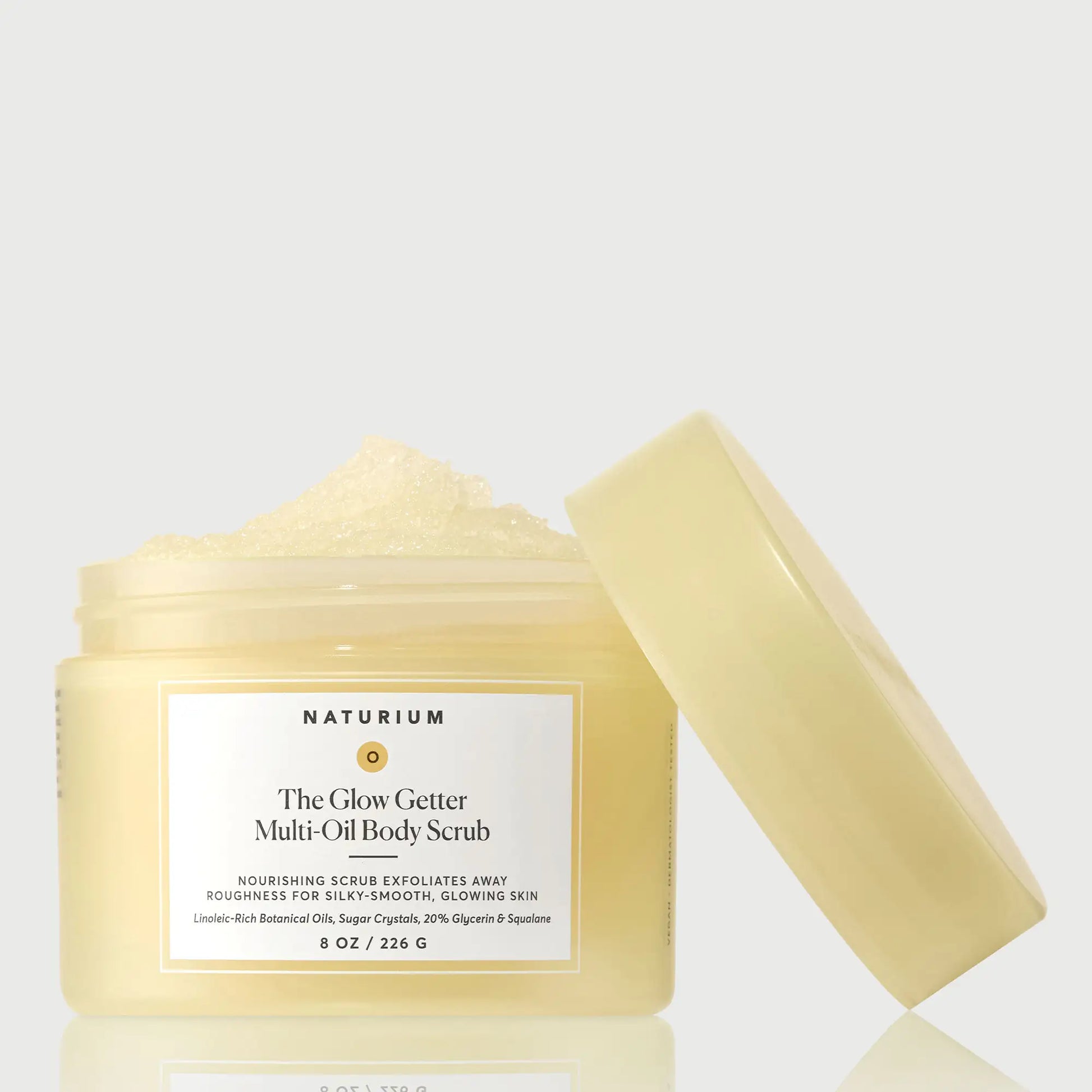 the-glow-getter-multi-oil-body-scrub-s6 NATR-40028-GlowGetter-Multi-Oil-Body-Scrub-Front-CapOff-bonebkgd.webp