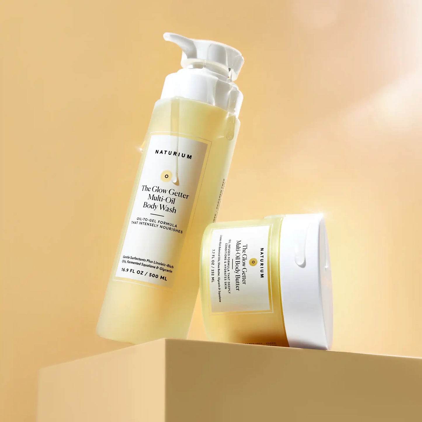 the-glow-all-out-body-bundle-c6 gg-bodybutter_1464-crop_revcolor_FL.webp
